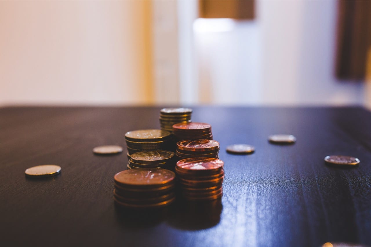 stacked change on a table