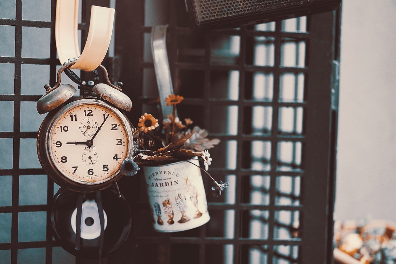 alarm clock and flowers